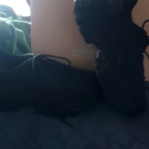 Black chunky sneakers. Not heavy on feet at all. Very Comfortablenly wore once.